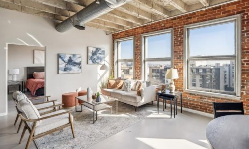 furnished living room with beautiful city views