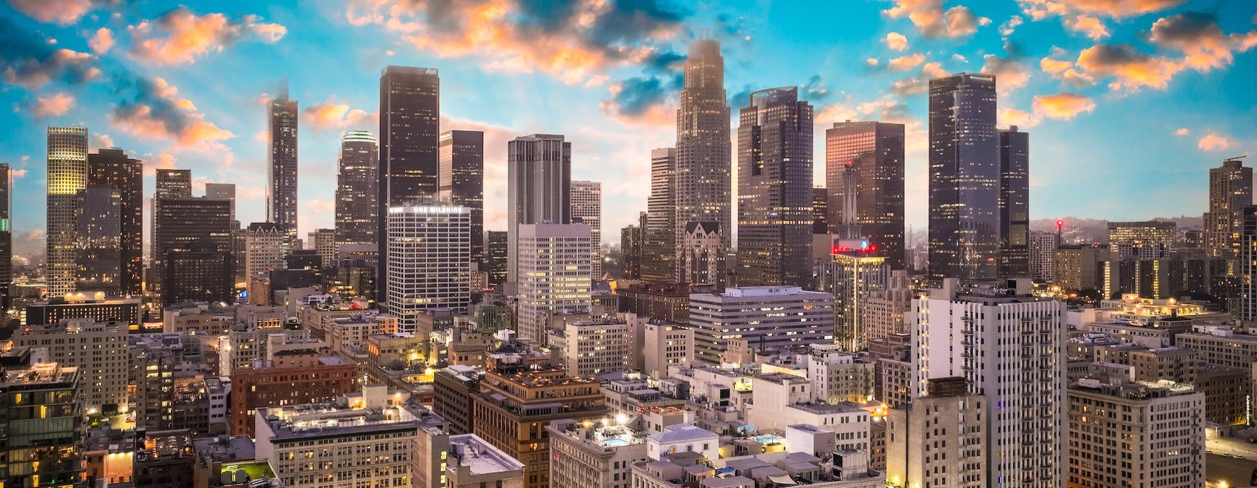 a cityscape under a blue sky