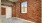 a brick building with a window