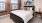 large windows brighten bedroom