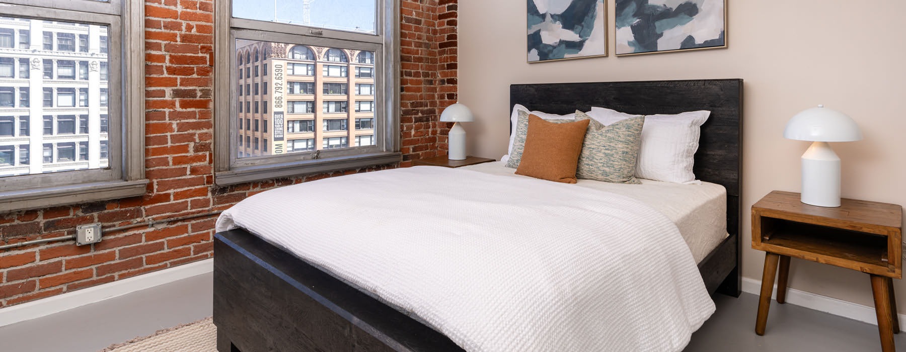 large windows brighten bedroom